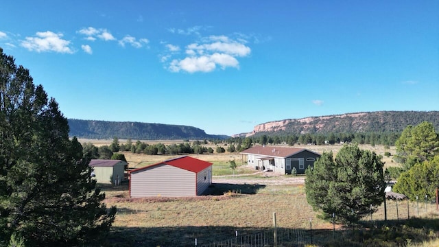 property view of mountains featuring a rural view