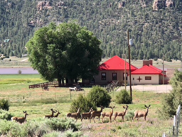 exterior space with a rural view