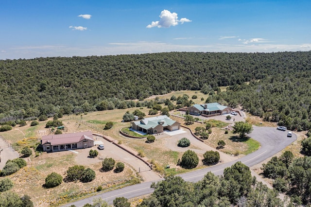 aerial view featuring a view of trees