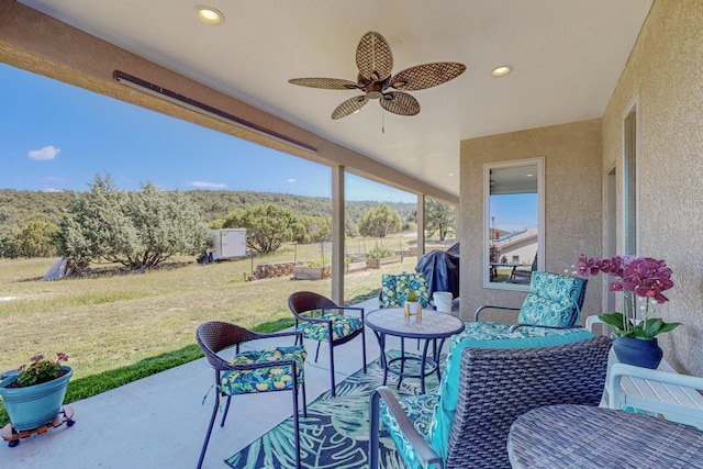 view of patio with ceiling fan