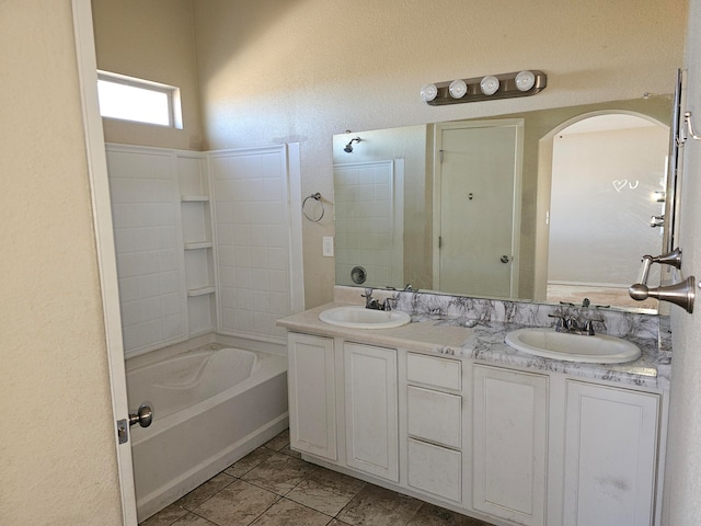 bathroom featuring vanity and tub / shower combination