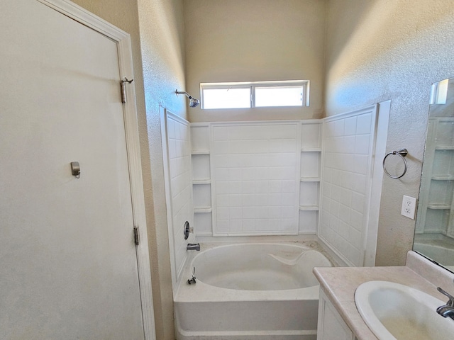 bathroom featuring shower / bathing tub combination and vanity