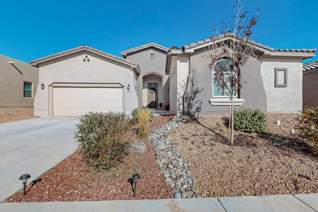 view of front of property with a garage