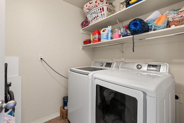 washroom with separate washer and dryer