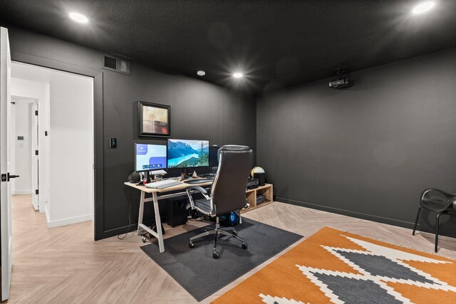 office area with parquet floors