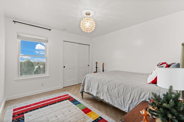 bedroom featuring light wood-type flooring