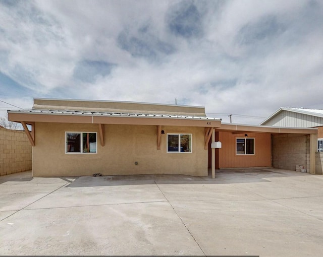 rear view of property with a patio