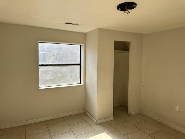 unfurnished bedroom featuring a closet