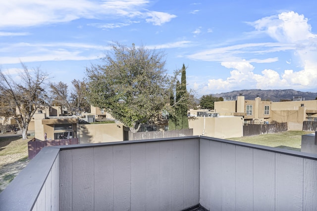 balcony featuring a mountain view