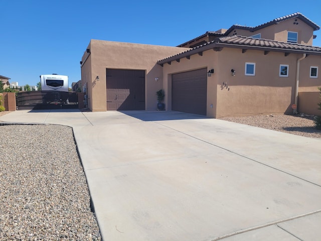 view of property exterior featuring a garage