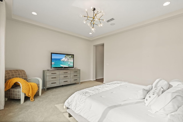 bedroom featuring light colored carpet and an inviting chandelier