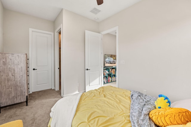 carpeted bedroom with ceiling fan