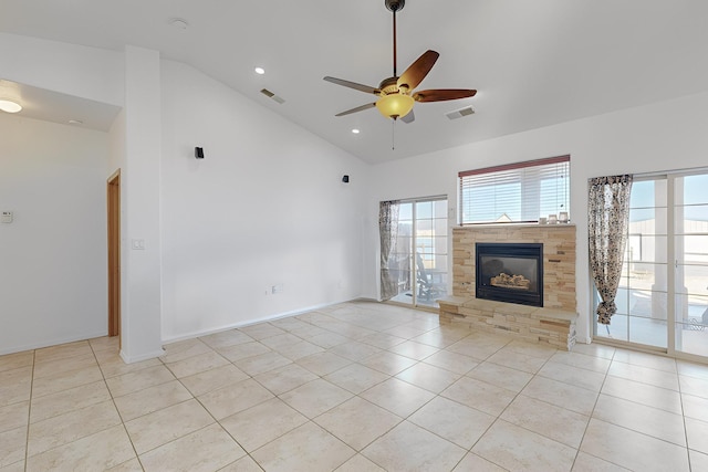 unfurnished living room with ceiling fan, light tile patterned flooring, and high vaulted ceiling