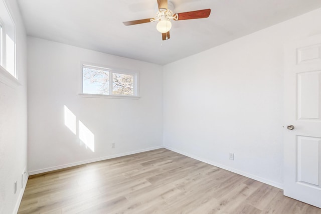 unfurnished room featuring ceiling fan and light hardwood / wood-style floors