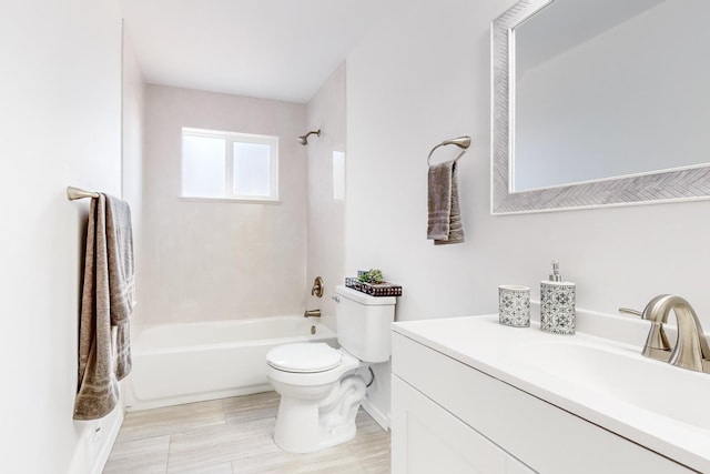 full bathroom with vanity, bathtub / shower combination, and toilet