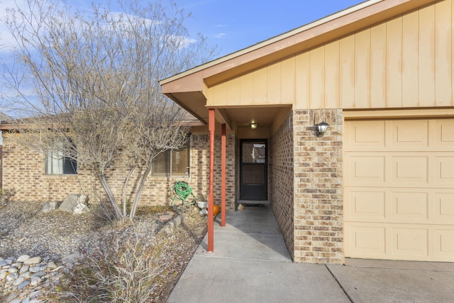 property entrance with a garage