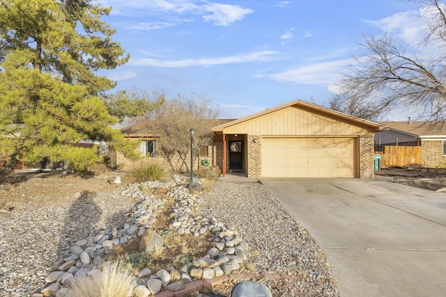 ranch-style home featuring a garage