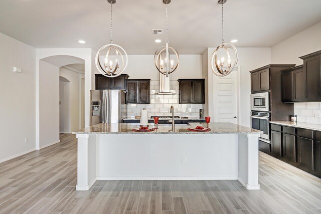 hallway featuring light hardwood / wood-style flooring