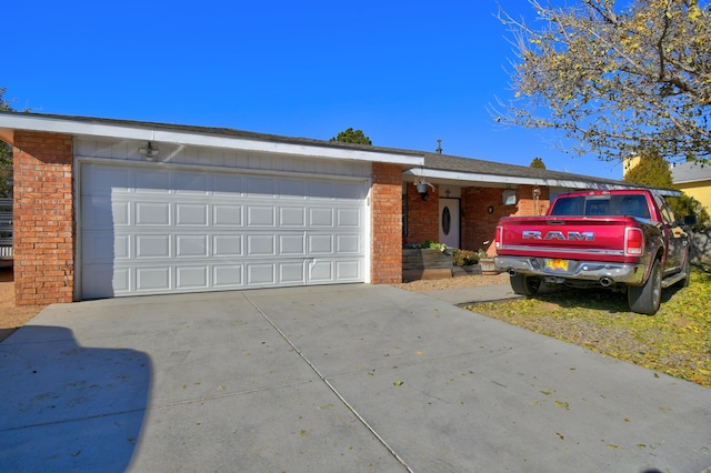 ranch-style home with a garage