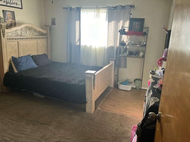 bedroom featuring carpet