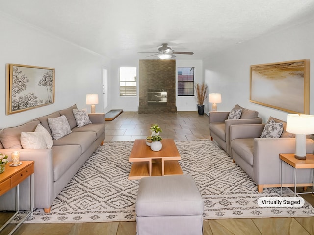 tiled living room with ceiling fan