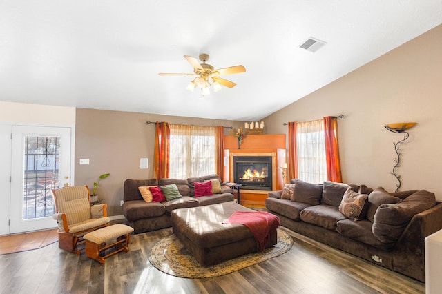 living room featuring a healthy amount of sunlight and wood-type flooring