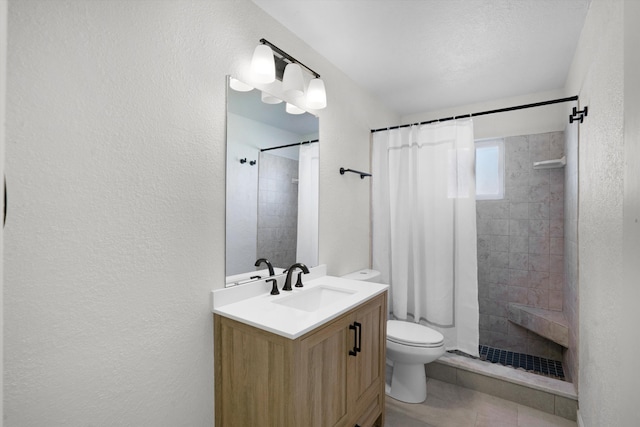 bathroom with vanity, tile patterned flooring, toilet, and a shower with shower curtain