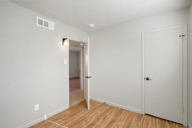 unfurnished bedroom featuring light hardwood / wood-style floors