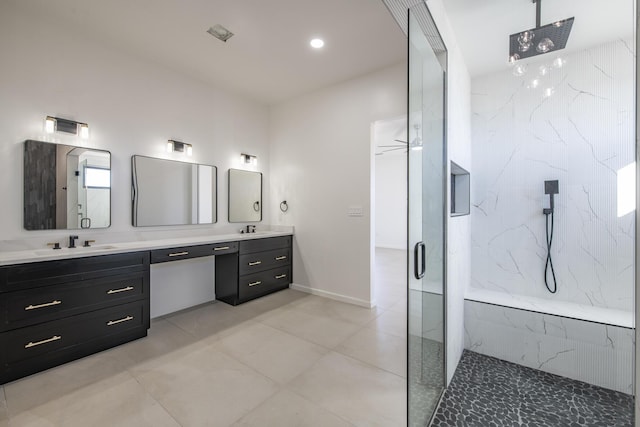 bathroom featuring vanity, tile patterned floors, an enclosed shower, and ceiling fan