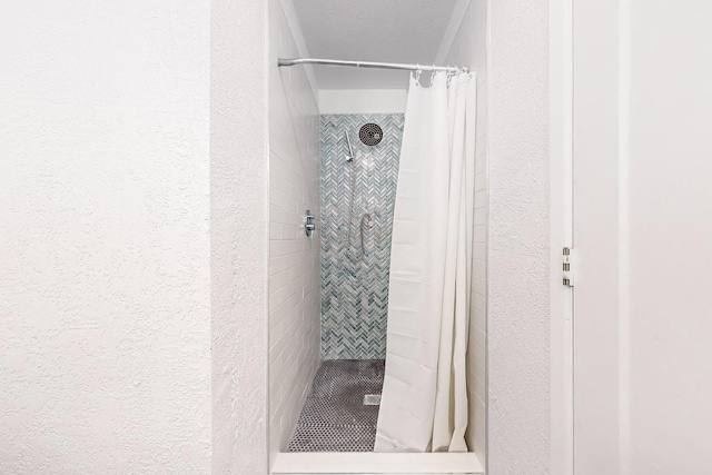 bathroom with a shower with shower curtain