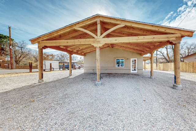 exterior space featuring a carport