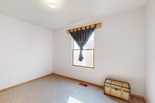 view of carpeted spare room