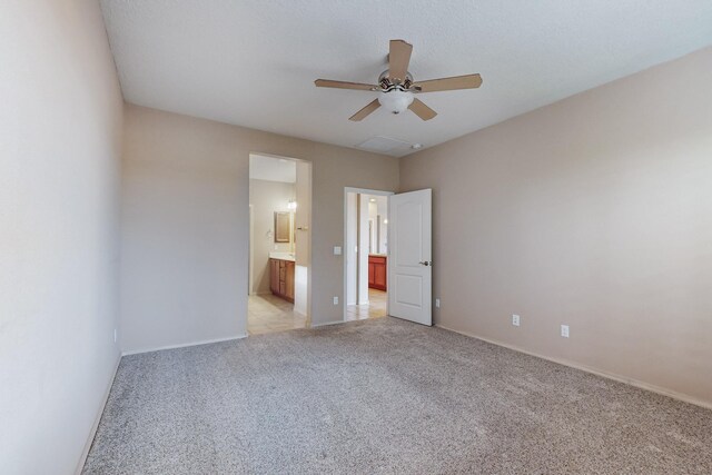 bathroom featuring tile patterned floors, vanity, and an enclosed shower