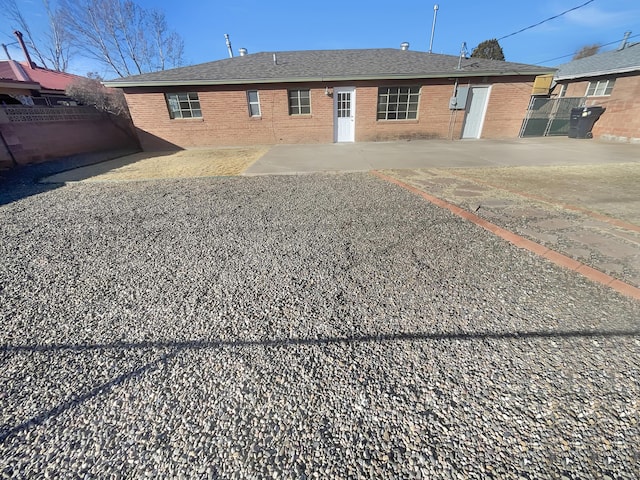 rear view of house featuring a patio