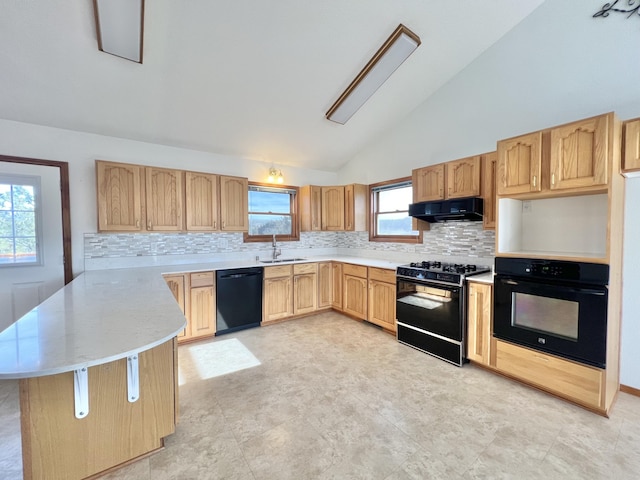 kitchen with sink, light brown cabinets, tasteful backsplash, range hood, and black appliances