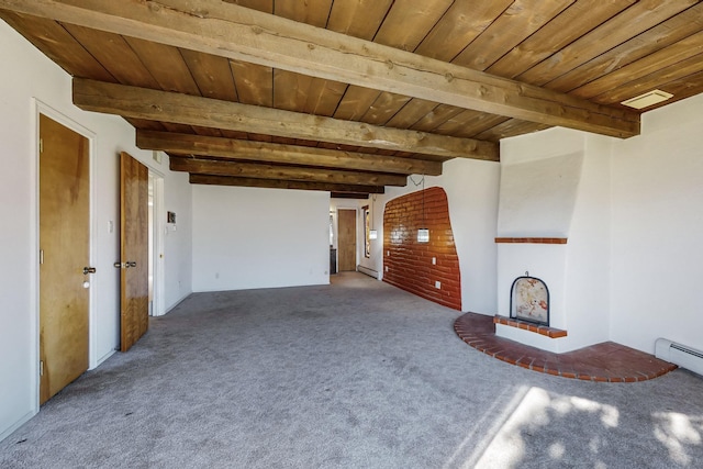 unfurnished living room with carpet flooring and wood ceiling