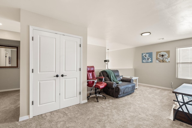 living area with carpet floors