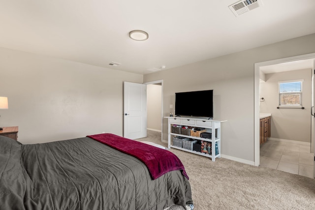 bedroom featuring light carpet