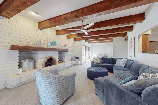 living room featuring a brick fireplace, beam ceiling, and light carpet