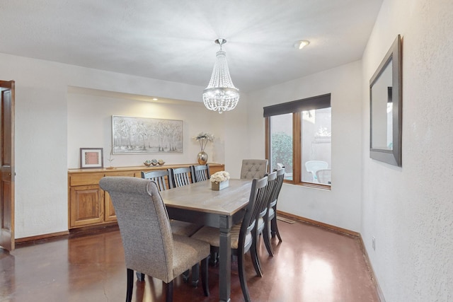 dining room with an inviting chandelier