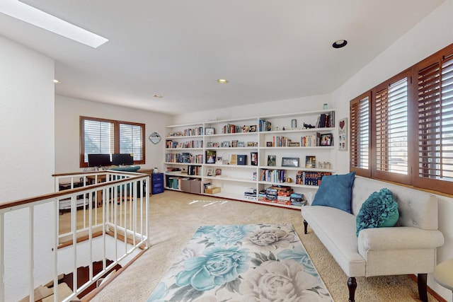 sitting room with carpet flooring