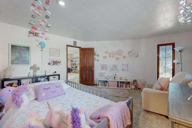 bedroom featuring a textured ceiling