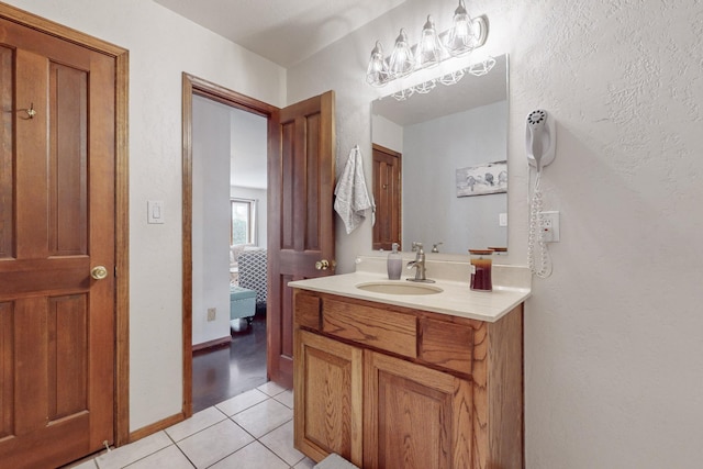 bathroom with vanity and tile patterned flooring