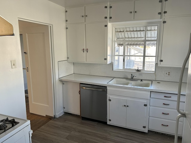 kitchen with white appliances, white cabinets, sink, decorative backsplash, and dark hardwood / wood-style flooring