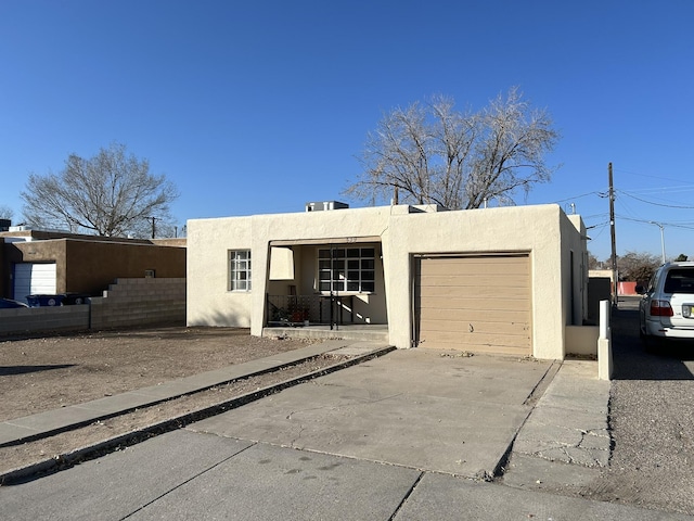 adobe home with a garage