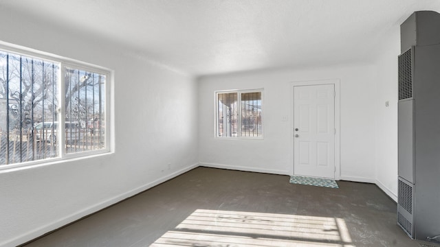 empty room featuring plenty of natural light