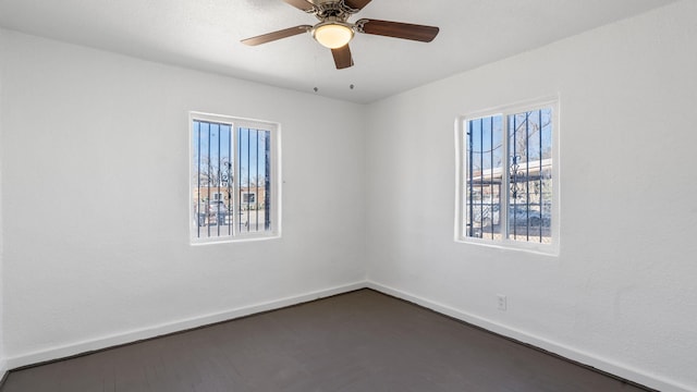 unfurnished room featuring ceiling fan