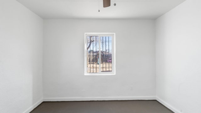 empty room featuring ceiling fan