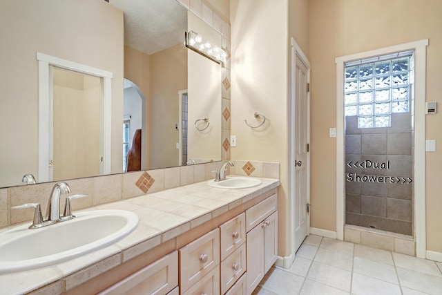 bathroom featuring vanity and tile patterned floors