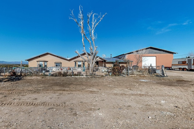 6284 State Highway 55, Mountainair, NM 87036 - view of front of property with stucco siding
